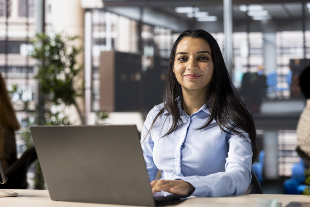 Background verification for banks and NBFCs – employee reviewing documents and verifying credentials in BFSI sector