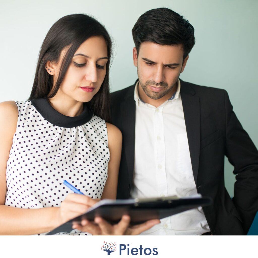 HR professionals analyzing fake degrees and fake payslips using digital verification tools by Pietos