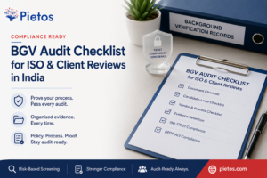 Professional blog banner for Pietos featuring a BGV audit checklist for ISO 27001 and client compliance reviews in India. The image shows a clipboard with an audit checklist, a background verification records file, and security-themed visuals, highlighting audit readiness, documentation, compliance, and risk-based background verification.