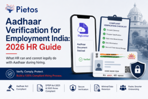 Pietos blog banner titled "Aadhaar Verification for Employment India: 2026 HR Guide" featuring a smartphone displaying DigiLocker-based Aadhaar verification, a compliant verification checklist, a sample Aadhaar card, and security icons. The image highlights compliant Aadhaar verification for employment, DigiLocker authentication, DPDP Act 2023 and 2025 Rules compliance, secure identity verification, and privacy-first hiring practices for HR and compliance teams in India.